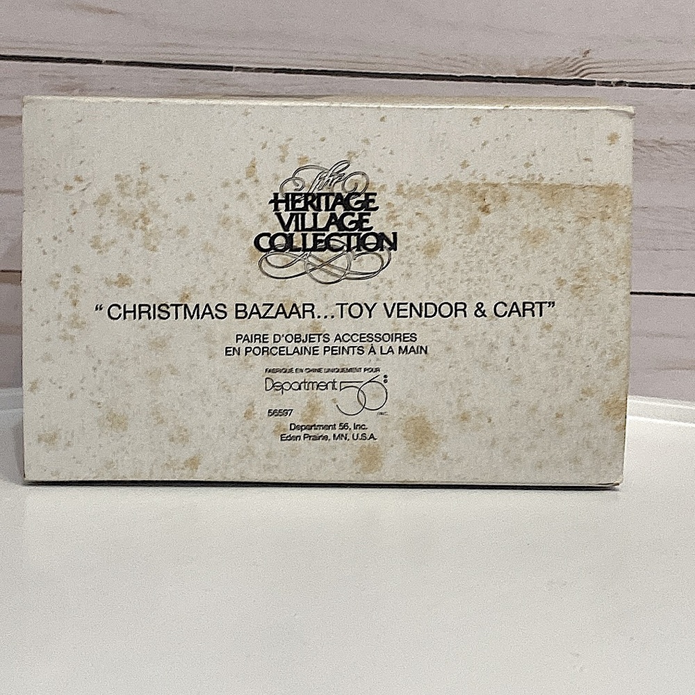 DEPARTMENT 56 - Christmas Bazaar Toy Vendor-Heritage Village-New England Village - Picture 9 of 9